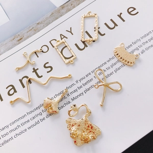 Gouden DIY-sieradenhangerset met geometrische vormen en ginkgoblad ontwerpen