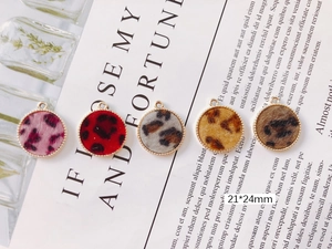 Five round leopard print DIY charms with gold beaded edges in assorted colors, 21x24mm