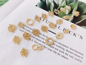Set of 20 golden alloy charms with tree of life, mandala and feather designs for DIY jewelry