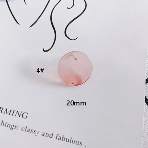 Macro shot of 20mm round pink translucent resin earring component accessory