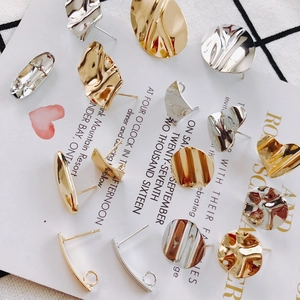 Collection of geometric S925 silver needle earrings in irregular gold and silver finishes