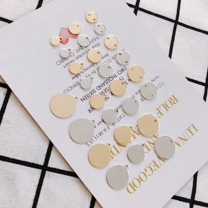 Polished round brass pendant charms in gold and silver for DIY jewelry making