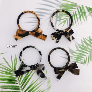 Set of 4 leopard print and camouflage bow pendants for DIY jewelry and hair accessories