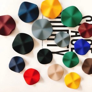 Macro view of colorful irregular matte resin earring pendants for DIY jewelry making