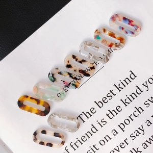 Set of 9 hollow oval acrylic jewelry pendants in marble and tortoiseshell patterns
