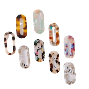 Hollow oval acrylic acetate pendants for DIY jewelry in various marbled patterns and colors