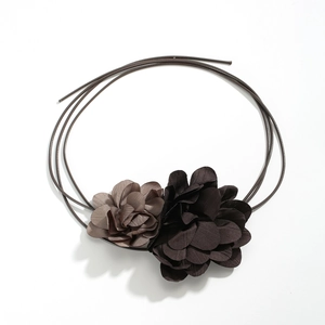 Elegant vintage two-tone fabric rose necklace with layered petals and dark brown cord