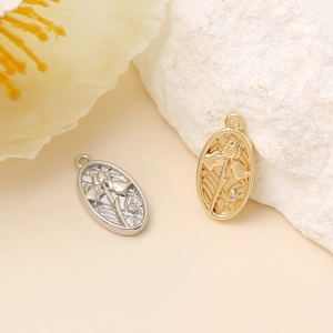 Oval floral pendant with zircon inlay for jewelry making in gold and silver finishes