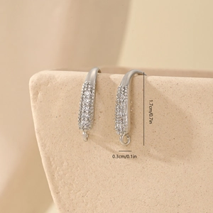 Close-up of pavé-set cubic zirconia ear hooks with dimensions 1.7cm in height