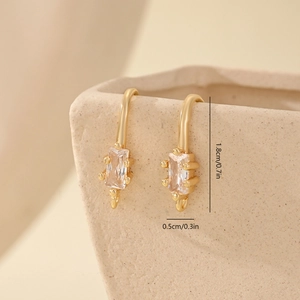 Macro view of gold metal earring hooks with cubic zirconia showing 1.8cm length detail
