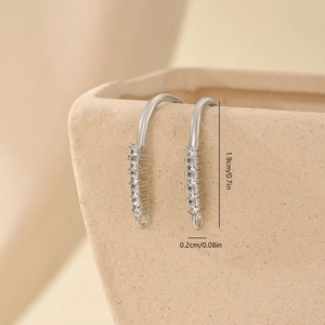 Detailed view of silver zircon earring hooks with dimensions 1.9cm height and 0.2cm width