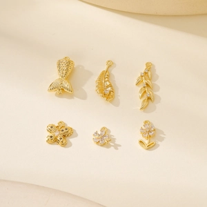 Golden geometric jewelry pendants set with cubic zirconia for DIY necklaces and bracelets