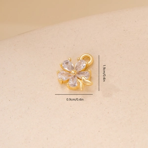 Detail of flower zircon pendant with golden butterfly showing 1.9cm height scale