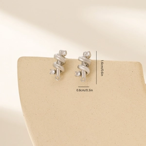 Detail view of silver twisted rope stud earrings with sparkling white cubic zirconia stones