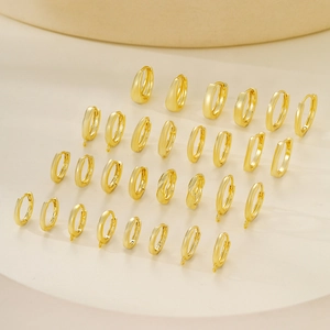 Polished gold-plated metal earring findings in various shapes for DIY jewelry making
