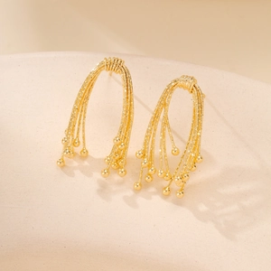 Elegant gold-plated ribbon tassel earrings with micro-bead details and metallic fringe