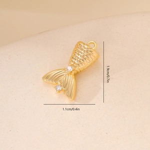 Detailed view of a gold-plated fishtail pendant with zircons showing dimensions of 1.9x1.1 cm