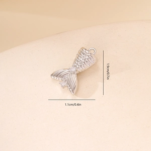 Detailed close-up of a zircon mermaid tail pendant with 1.9cm height dimensions