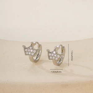 Macro detail of crown shaped cubic zirconia earring clasp with 1.3cm size measurement