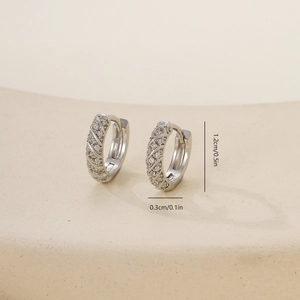Detailed view of silver twisted hoop earrings with cubic zirconia, size 1.2cm by 0.3cm