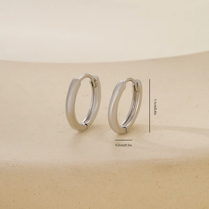Detailed view of polished silver hoop earrings with dimensions 1.1cm x 0.2cm indicated