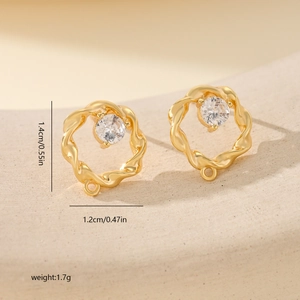 Detailed view of gold-plated twisted flower earrings with zircon inlays and dimensions