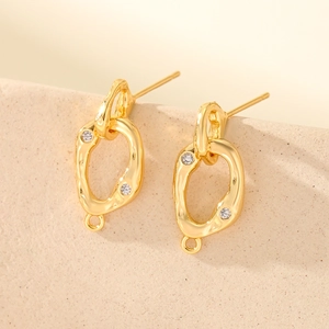 Irregular gold-plated oval stud earrings with tiny crystals and DIY loop detail