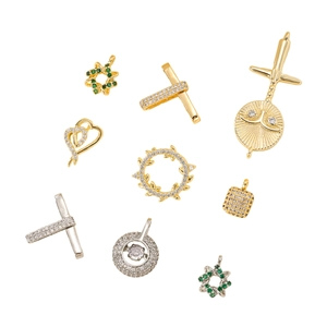 Assorted gold and silver geometric jewelry pendants with cubic zirconia for DIY necklaces