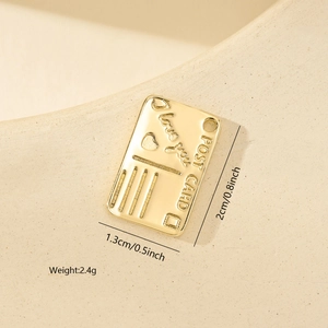 Detail of gold postcard pendant with I love you relief and 2.0x1.3cm size marking