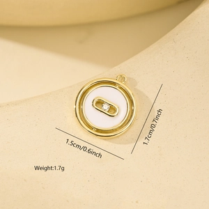 Macro view of gold round pendant with sliding zircon and white shell inlay detail