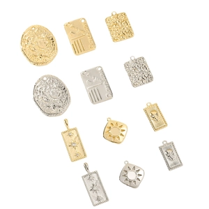 Assorted gold and silver square metal pendants with sun motifs for DIY jewelry making