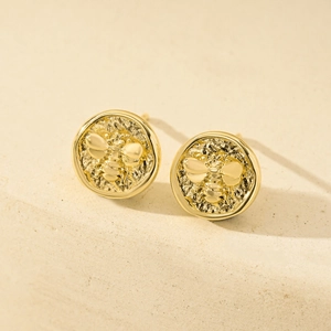 Golden round geometric coin earrings with embossed honeybee and hammered texture
