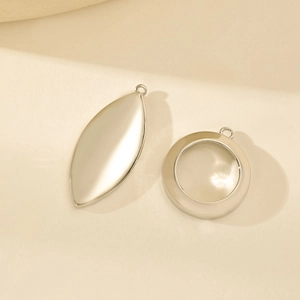 Polished silver-tone marquise and round open bezel pendant charms for DIY jewelry making