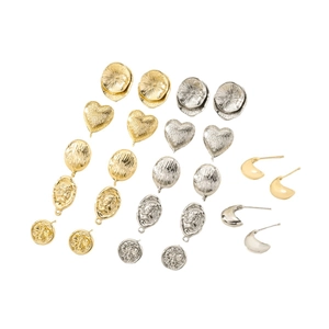 Collection of vintage geometric gold and silver metal earrings and heart shaped pendants