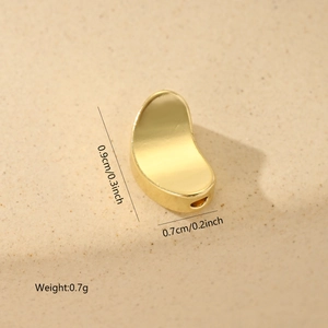 Detailed view of a 9mm gold bean spacer bead with dimensions 0.9x0.7cm for DIY jewelry
