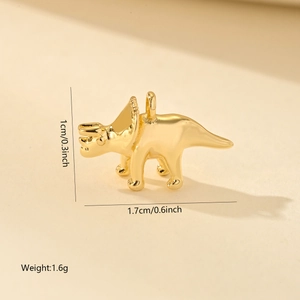 Macro detail of a 18K gold plated triceratops dinosaur pendant with weight and size specs
