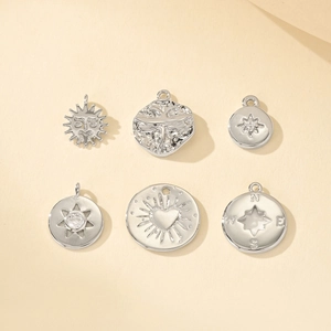 Lot de pendentifs argentés pour bijoux DIY avec soleil, libellule, étoile et boussole