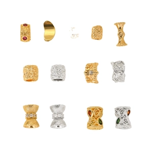 Selection of geometric gold and silver spacer beads with zircon inlays for jewelry making