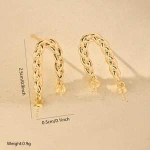 Macro detail of gold-plated woven earrings with pearl cup holder showing size measurements