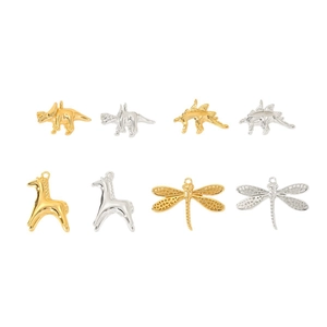 8-piece set of gold and silver plated animal pendants featuring dinosaurs and dragonflies