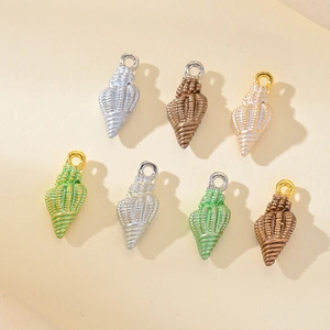 Set of colorful copper sea shell pendants for DIY jewelry making and handmade crafts