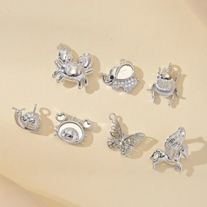 Polished silver animal charms set including elephant and butterfly for DIY jewelry making