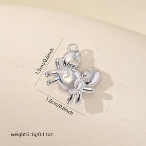 Macro shot of silver crab pendant charm showing 1.5cm by 1.6cm dimensions for DIY jewelry