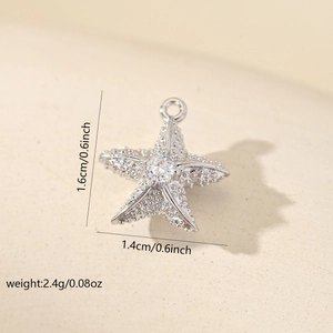 Detailed size chart of a silver starfish pendant with zircon and dimensions 1.6x1.4cm