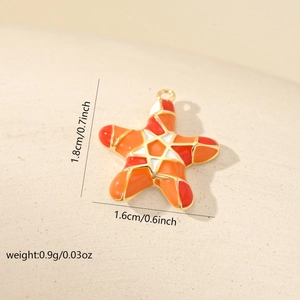 Detail of starfish enamel pendant with size measurements and orange-red design