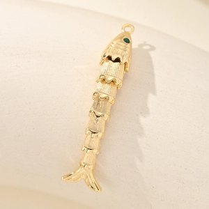 Pendentif carpe koï articulé doré avec œil vert pour création bijoux DIY