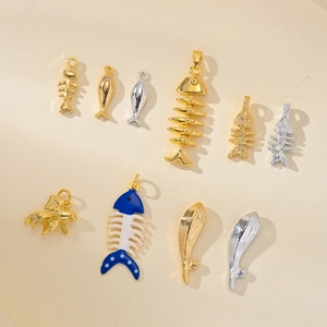 DIY ocean-themed koi and fishbone charms for necklaces and bracelets in gold and silver