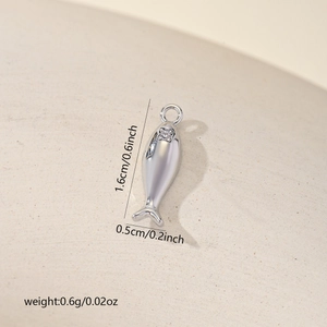 Detailed size view of a small silver koi fish pendant with rhinestone inlay for DIY jewelry