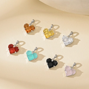 Seven colorful heart-shaped zircon pendants with silver metal settings for DIY jewelry making