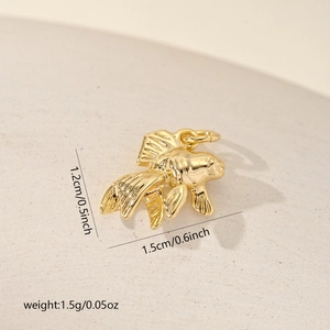 Detailed view of golden koi fish charm showing 1.2cm x 1.5cm size and 1.5g weight info